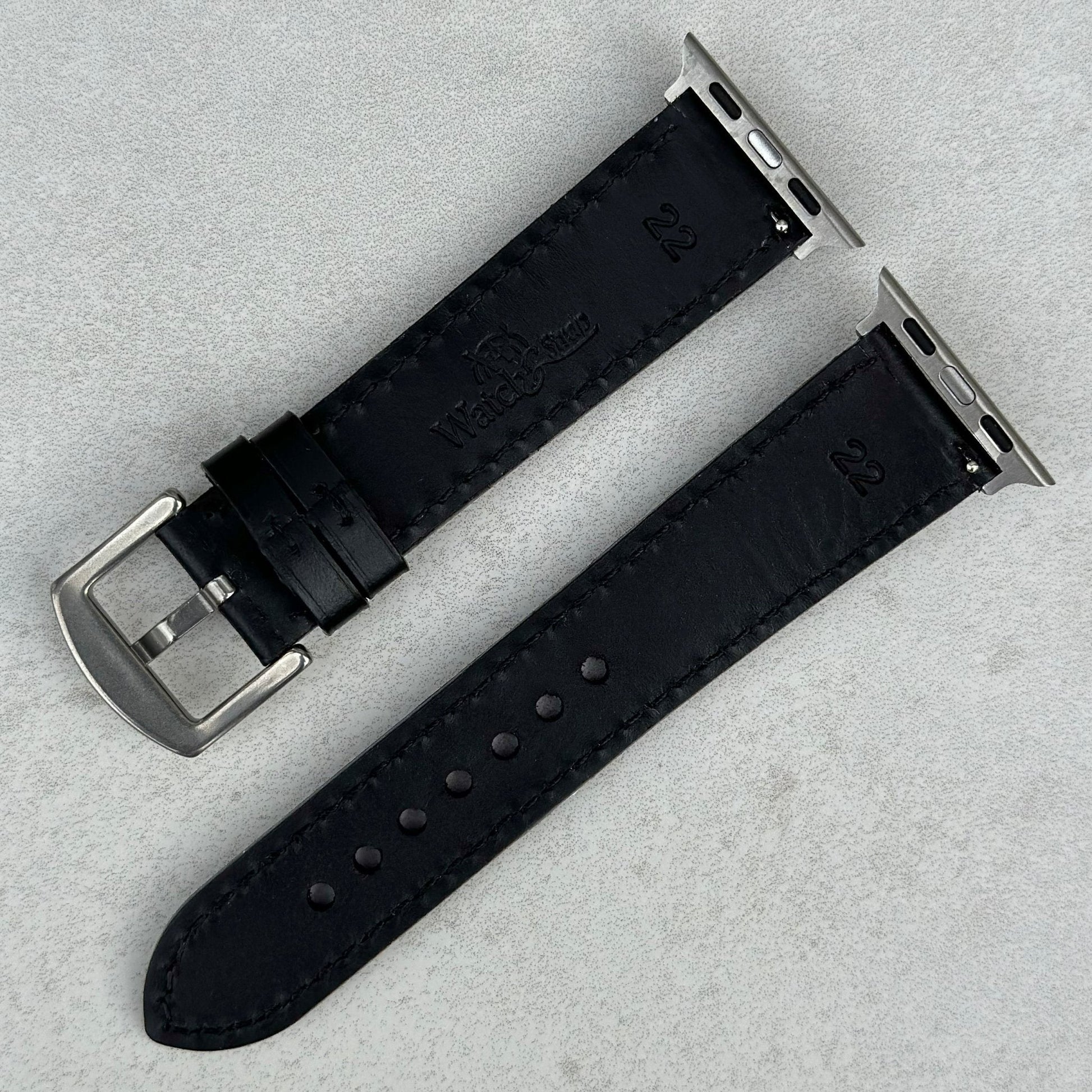 Underside of the Athens jet black full grain leather watch strap. Watch And Strap logo debossed into the rear of the strap.