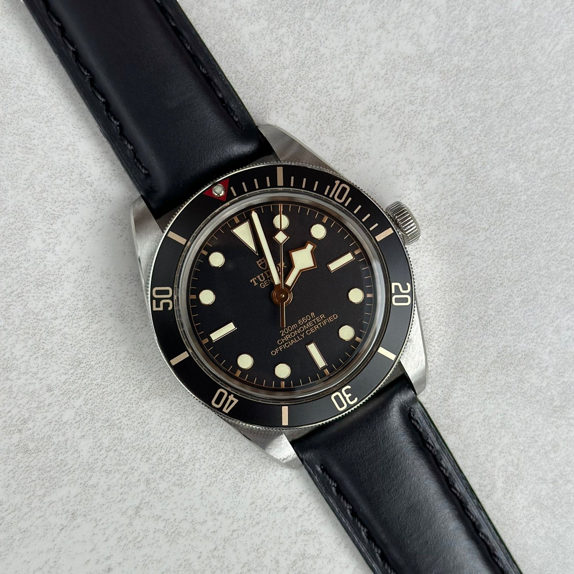 Jet black full grain leather watch strap on the Tudor Blackbay 58. 18mm, 20mm, 22mm, 24mm. Watch And Strap.