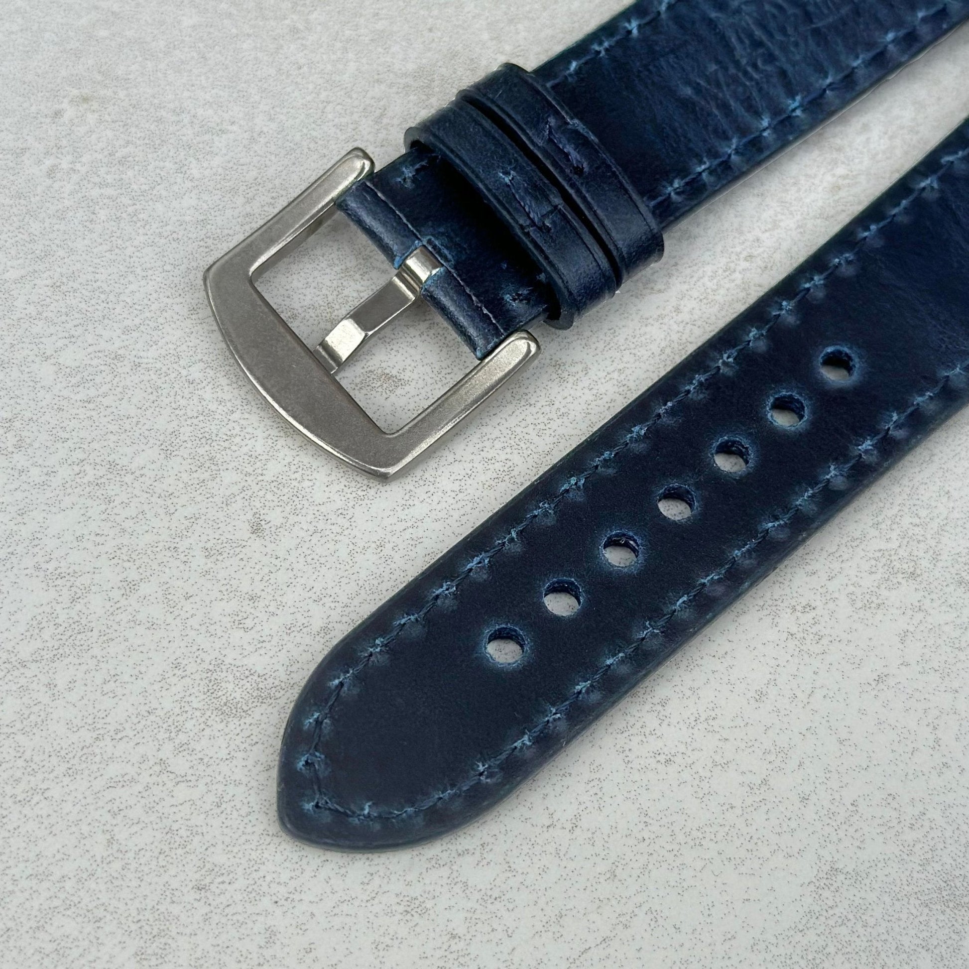 Underside of the 316L stainless steel buckle attached to the Athens Deep Ocean Blue leather watch strap.