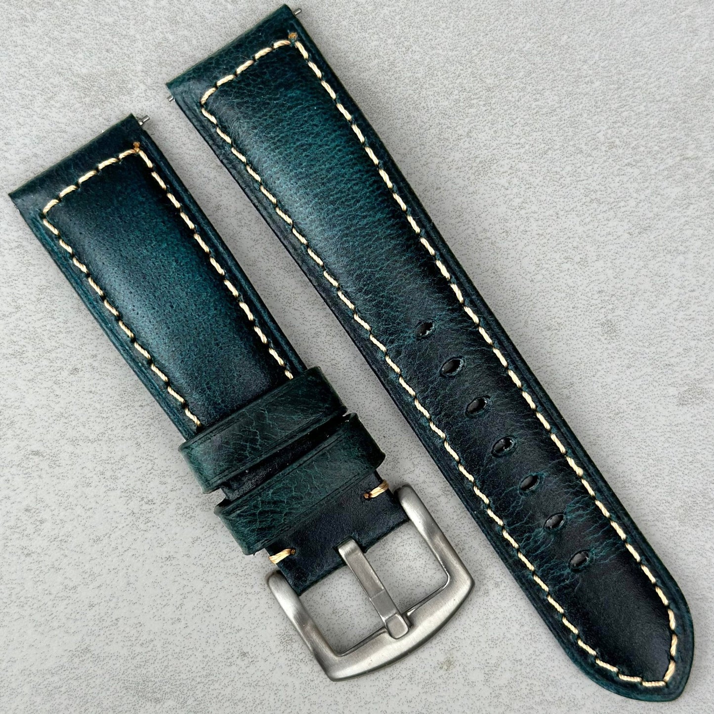 Berlin blue full grain leather watch strap. Navy blue leather with electric blue underneath. Contrast ivory stitching.