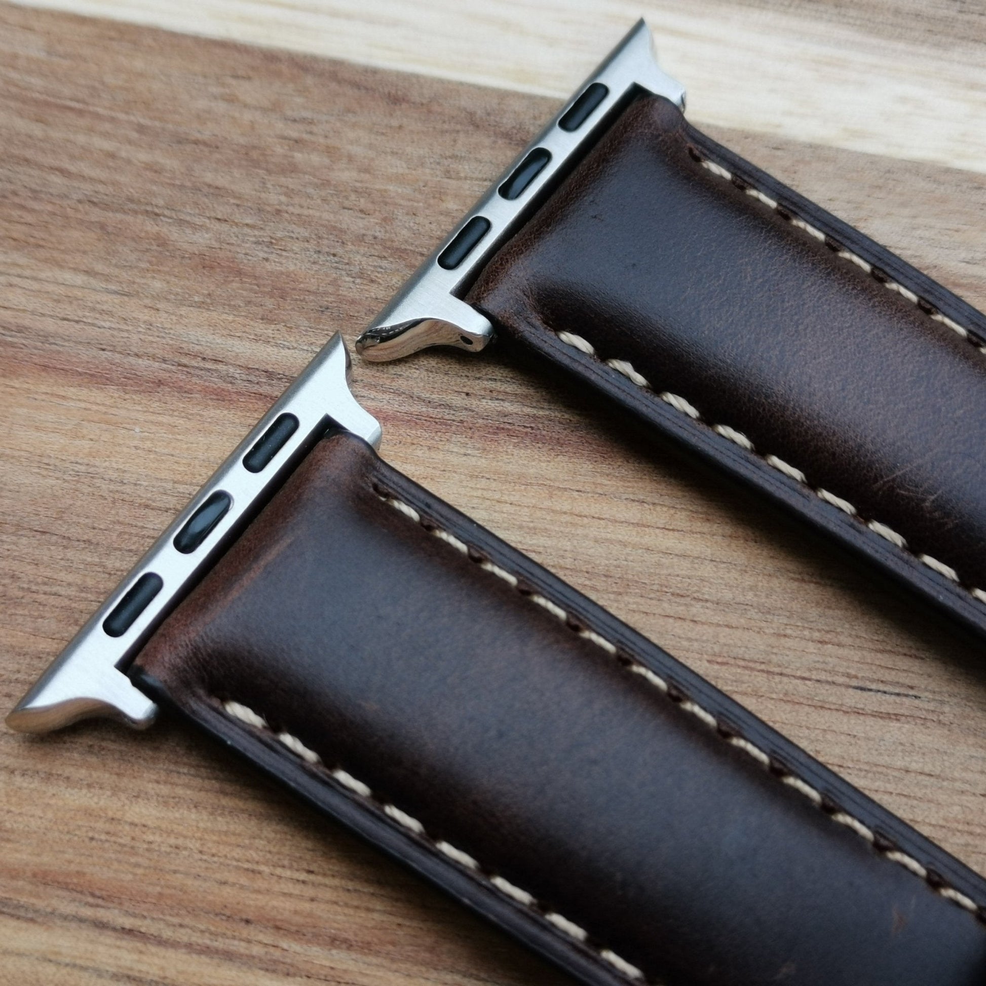Top of the Oslo brown full grain leather apple watch strap. With handstitched contrast ivory stitching.