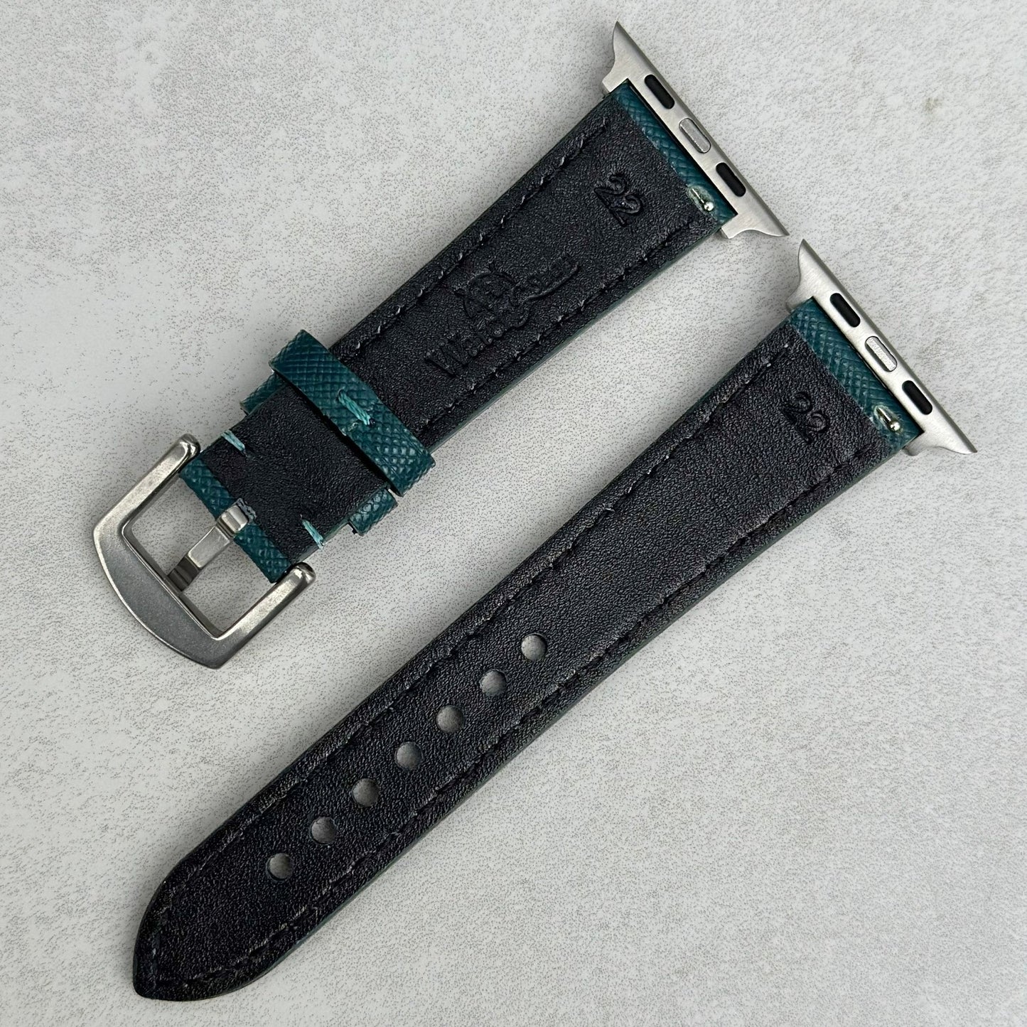 Rear of the Florence teal Saffiano leather Apple Watch strap. Watch And Strap logo.