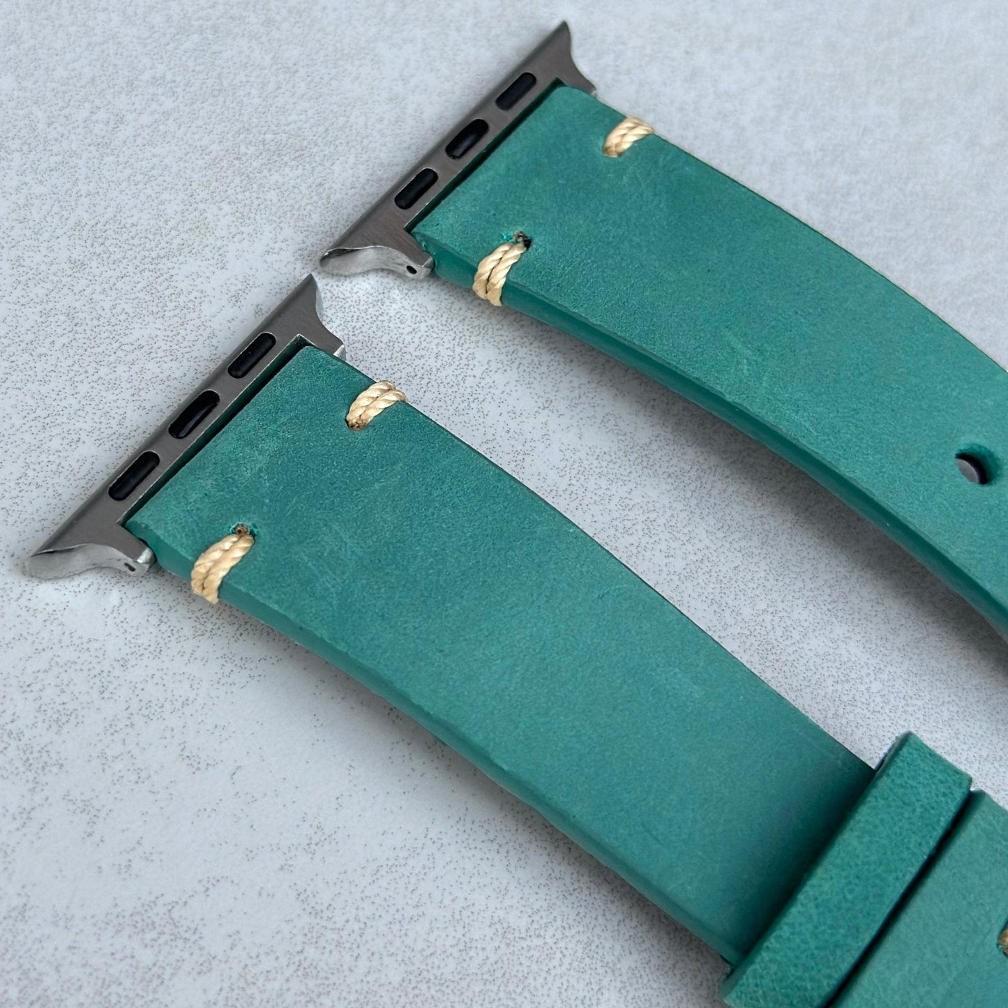Top of the Madrid Caribbean blue horse leather apple watch strap. Contrast ivory stitching. Watch And Strap.