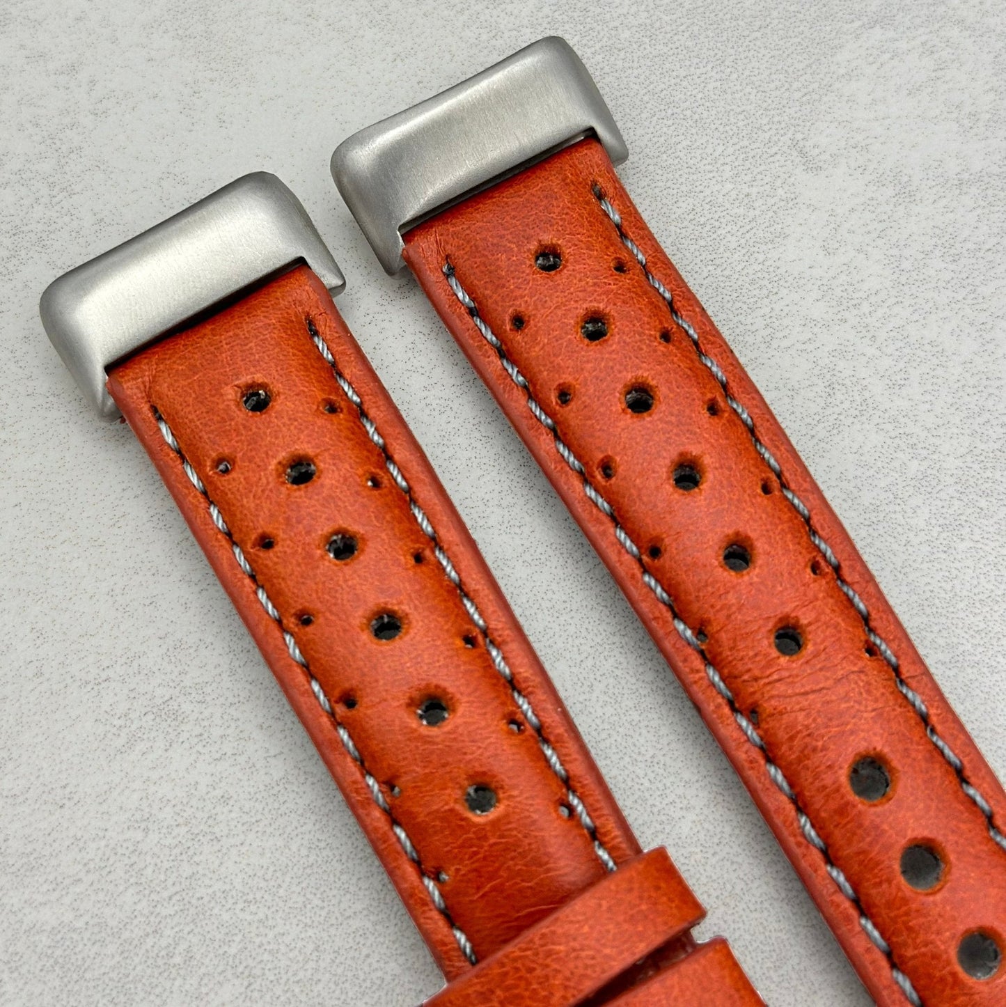The Monte Carlo: Russet Orange Perforated Leather Fitbit Charge Watch Strap