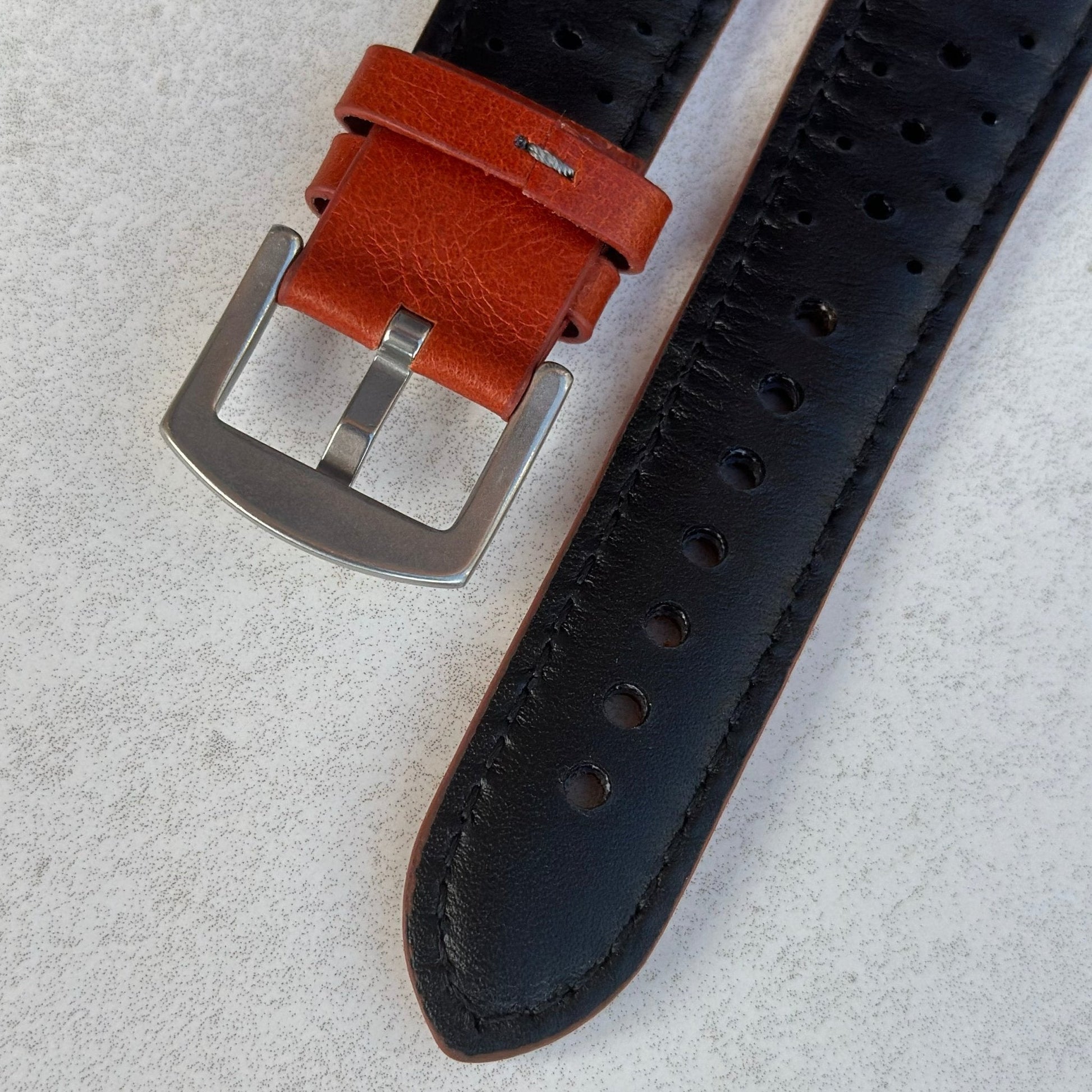 Underside of the buckle on the Montecarlo orange full grain leather Apple Watch strap. Watch And Strap