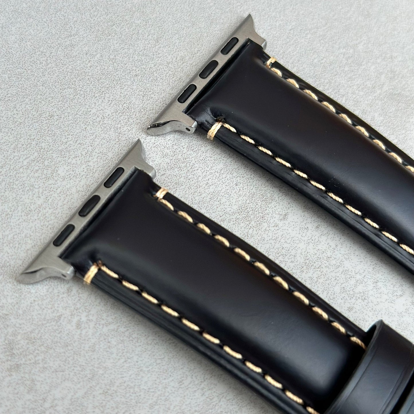 Top of the Oslo black full grain leather Apple Watch Strap. Contrast ivory stitching. Padded leather Apple Watch strap.