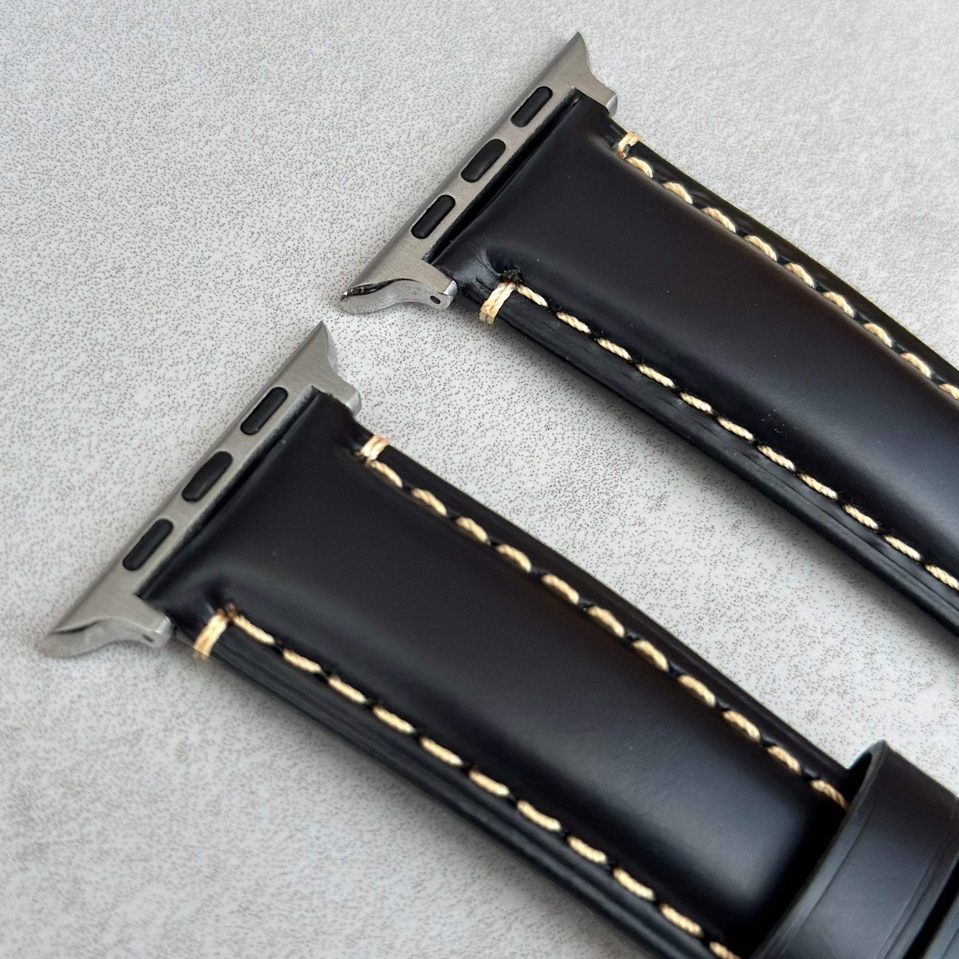 Top of the Oslo black full grain leather Apple Watch Strap. Contrast ivory stitching. Padded leather Apple Watch strap.