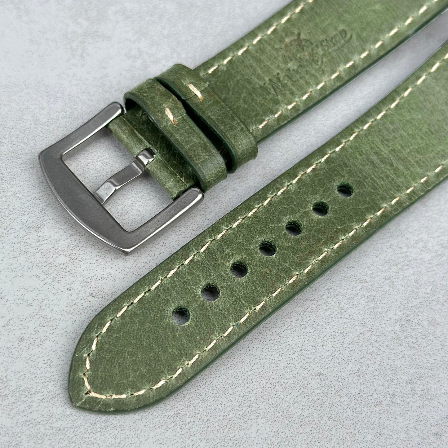 Underside of the 316L stainless steel buckle on the Rome green Italian leather watch strap. Watch And Strap.